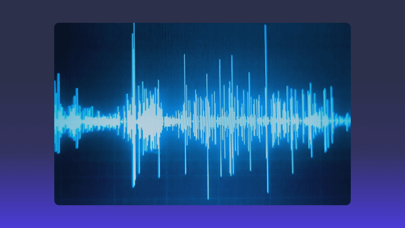 This dynamic blue waveform visually represents audio frequencies, often seen in sound editing software or a music visualizer. A vibrant blue digital sound wave or audio equalizer display on a dark screen.