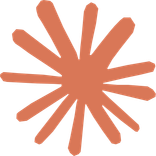 Irregular red-brown starburst splat against a dark background.