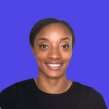 Headshot of a smiling young Black woman with dark hair against a blue background.